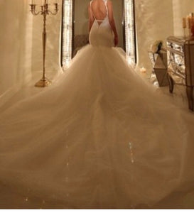 Custom 'Tinaâ€™s Dress' size 2 used wedding dress back view on bride