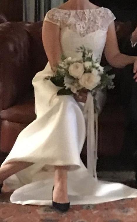 Karen Willish Holmes 'Kitty Bodice- Karly Skirt' size 10 used wedding dress front view on bride