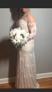 Inbal Dror '15-14' size 10 used wedding dress side view on bride