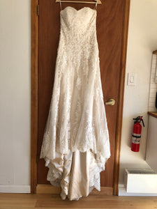 Maggie Sottero 'Viera' size 10 used wedding dress front view on hanger
