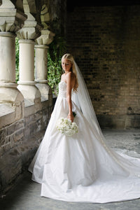 Reem Acra 'I'm Awesome' size 2 used wedding dress side view on bride