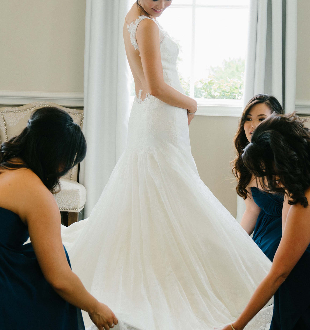 Augusta Jones 'Megan' size 6 used wedding dress side view on bride