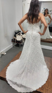 Paloma Blanca 'Modern' size 8 used wedding dress back view on bride