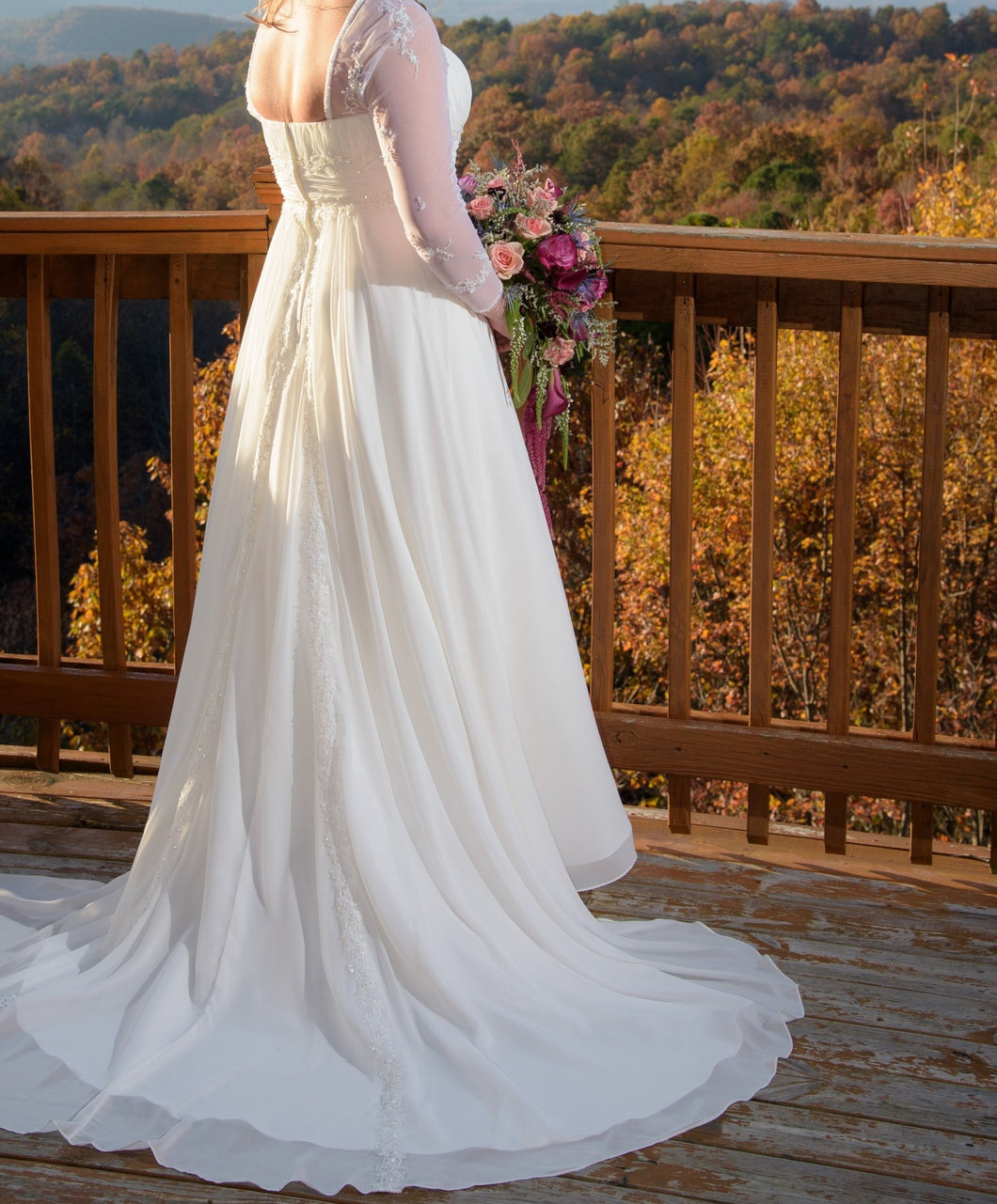 David's Bridal 'Soft Chiffon' size 14 used wedding dress side view on bride