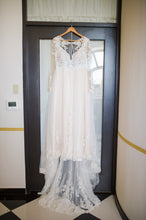 Load image into Gallery viewer, Essense of Australeia &#39;Illusion Lace&#39; size 14 used wedding dress front view on hanger
