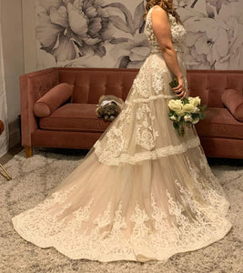 Randi Fenoli 'Spring 2018' size 10 used wedding dress side view on bride
