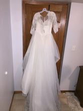 Load image into Gallery viewer, Oleg Cassini &#39;Organza 3/4 Sleeve&#39; size 6 new wedding dress back view on hanger
