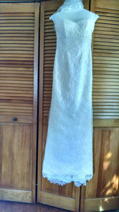 Paloma Blanca 'Strapless Ivory' size 4 used wedding dress front view on hanger