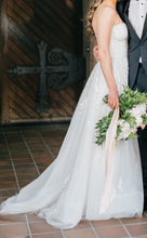 Load image into Gallery viewer, Reem Acra &#39;Fleur&#39; size 8 used wedding dress side view on bride
