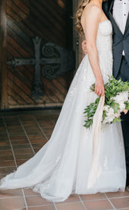 Reem Acra 'Fleur' size 8 used wedding dress side view on bride