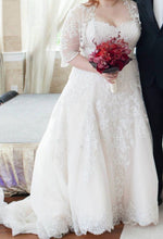 Load image into Gallery viewer, Eve Of Milady &#39;120089/4298&#39; size 20 used wedding dress front view on bride
