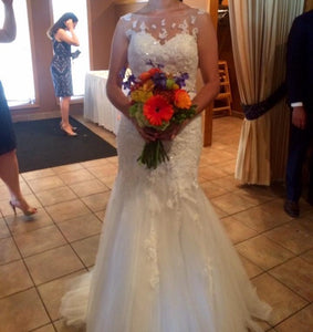 Elle Mariee 'Kara' size 14 used wedding dress front view on bride