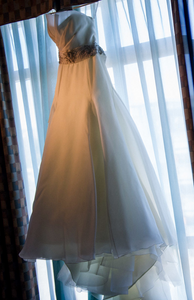 Rivini 'Nicoletta' size 4 used wedding dress front view on hanger