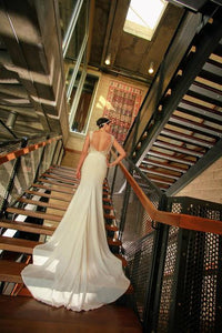 Eddy K. '1132' size 8 used wedding dress back view on bride
