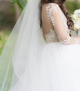 Hayley Paige 'Lorelei' size 10 used wedding dress side view on bride