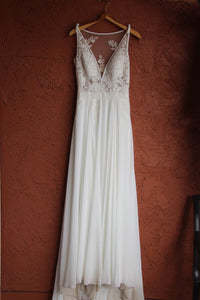 Pronovias 'Escala' size 4 used wedding dress front view on hanger