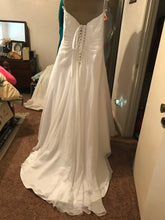 Load image into Gallery viewer, Davids Bridal &#39;Drape A-Line&#39; size 10 used wedding dress back view on hanger
