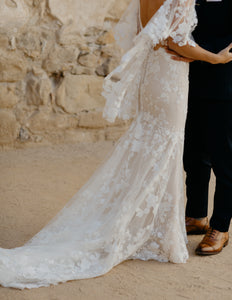 Martina Liana '1033' size 8 used wedding dress side view on bride