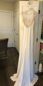 Pronovias 'Olalde' size 6 new wedding dress back view on hanger