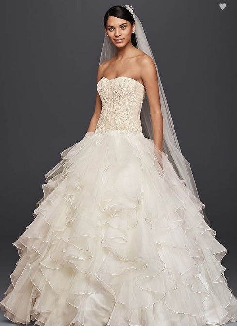 Oleg Cassini 'Strapless Ruffled' size 6 used wedding dress front view on model