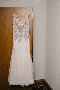 Badgley Mischka 'Ginger' size 16 used wedding dress front view on hanger