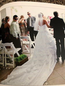 Oleg Cassini '7CT291' size 6 used wedding dress back view on bride