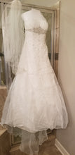 Load image into Gallery viewer, David&#39;s Bridal &#39;Ivory Strapless Organza&#39; size 8 used wedding dress front view on hanger
