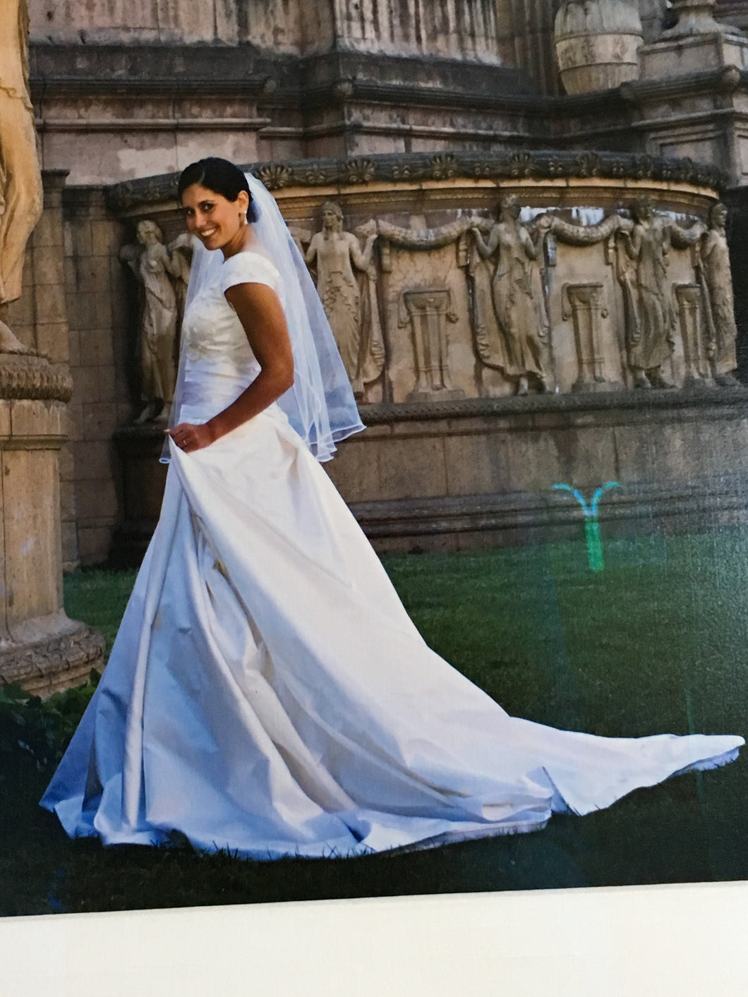 Custom 'Classic Ballgown' size 8 used wedding dress side view on bride