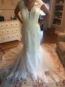 Galina Signature 'Illusion Deep Plunge' size 8 new wedding dress front view on bride