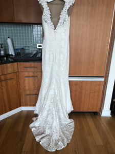 Amy Kuschel 'Avalon Flower Power' size 12 used wedding dress back view on hanger