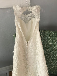 Custom 'DK' size 10 new wedding dress back view on hanger