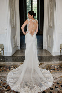 Berta 'Ivory White Lace 14-20' size 4 used wedding dress back view on model
