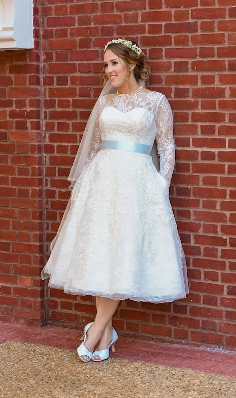 Oleg Cassini 'Long Sleeved Tea Length' size 12 used wedding dress front view on bride