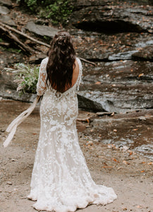 Custom 'Bohemian' size 6 used wedding dress back view on bride