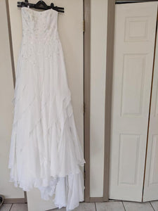 David's Bridal 'Strapless' size 4 used wedding dress front view on hanger