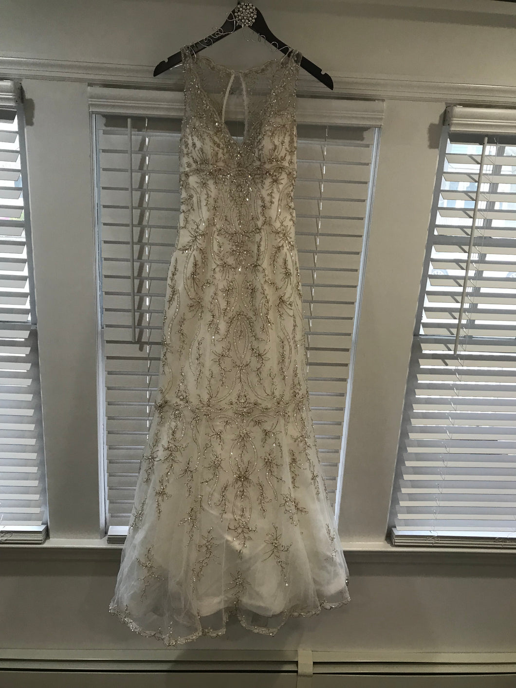 Maggie Sottero 'Blakely' size 2 used wedding dress front view on hanger