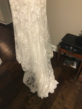 Load image into Gallery viewer, Eddy K &#39;1131&#39; size 4 used wedding dress view of hemline
