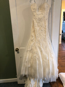 Mori Lee 'Madeline Gardner' size 6 used wedding dress front view on hanger