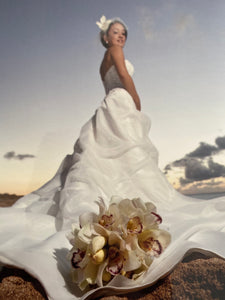 Custom 'A Line' size 4 used wedding dress side view on model