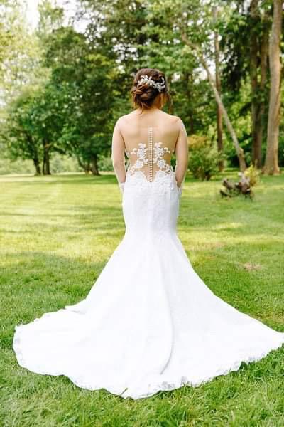 Truong Thanh Hai 'White Mermaid' size 0 used wedding dress back view on bride