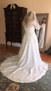 Oleg Cassini 'Off Shoulder Lace' size 14 used wedding dress back view on bride