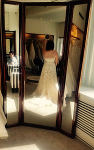 Carolina Herrera 'Addison' size 6 used wedding dress back view on bride