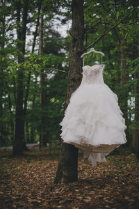 Oleg Cassini 'Organza Ruffled' size 16 used wedding dress front view on hanger