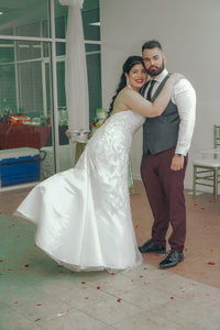 Oleg cassini 'Strapless' size 12 used wedding dress side view on bride