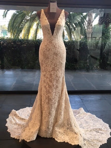 Pronovias 'Estela' size 2 used wedding dress front view on mannequin