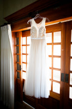 Load image into Gallery viewer, Watters &#39;Santina&#39; size 0 used wedding dress front view on hanger
