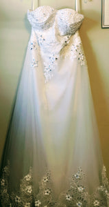 Custom 'Olivia' size 10 used wedding dress front view on hanger