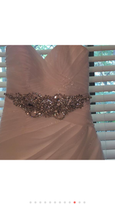 Pronovias 'Sweetheart Sparkle Princess' size 6 used wedding dress front view close up on hanger