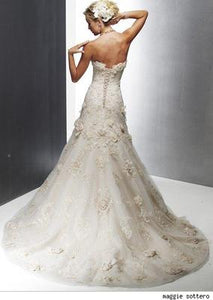 Maggie Sottero 'Rihanna Royale' size 8 used wedding dress back view on model
