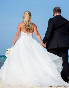Badgley Mischka 'Amal' size 10 used wedding dress back view on bride